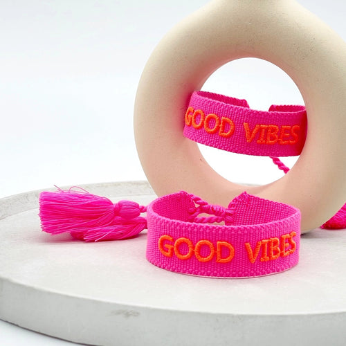 Webarmband "Good Vibes" neon pink/neon coral
