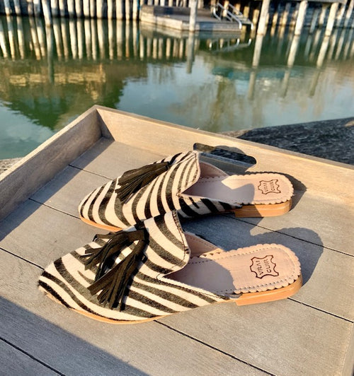 Leder Mules mit Quaste Zebra