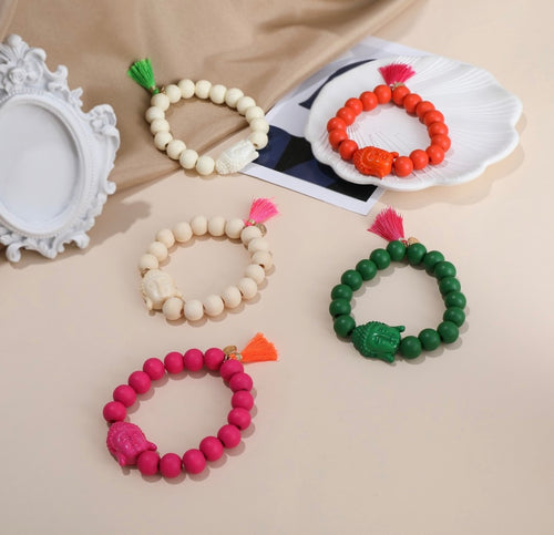 Holzarmband mit Buddhakopf mit bunter Quaste