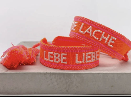 Webarmband "Lebe Liebe Lache" neon orange/neon pink
